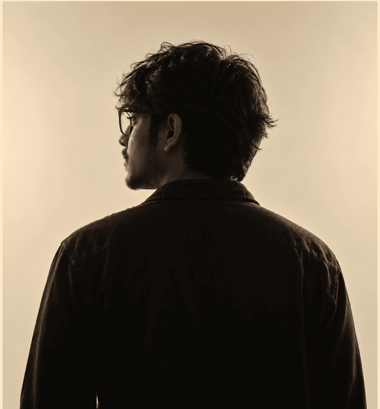 Contemplative Sepia Profile Portrait